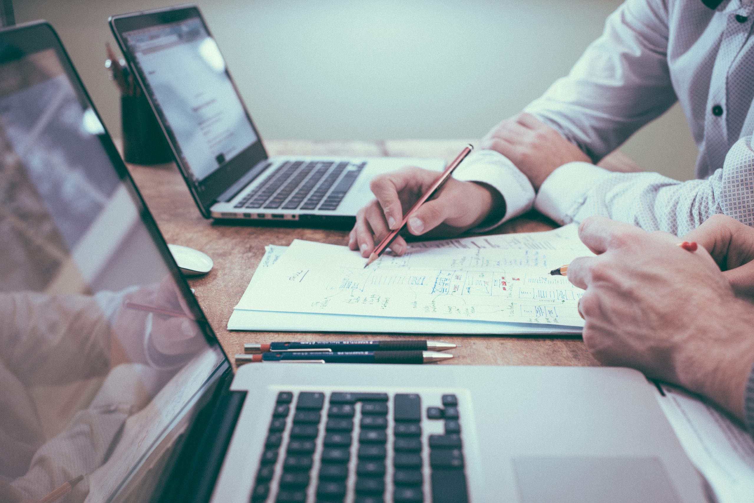 Accountant reviewing financial documents and charts