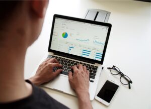 Team reviewing business reports together at a desk